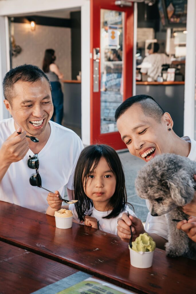 home family with pet eating ice cream